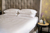 Bed made with Thomaston T-200 Sheets and Pillowcases.
