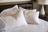 Bed made with Thomaston Mills T-310 Satin Stripe Sheets and Pillowcases.