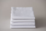 Thomaston Mills white T180 New Era Sheets folded and stacked.