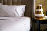 Bed made with Thomaston Mills Decorative Top Sheet